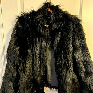 Black faux fur coat.